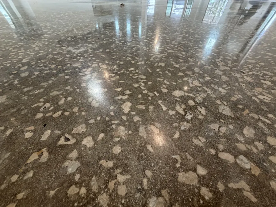 Polished concrete aggregate close-up showing natural stone beauty